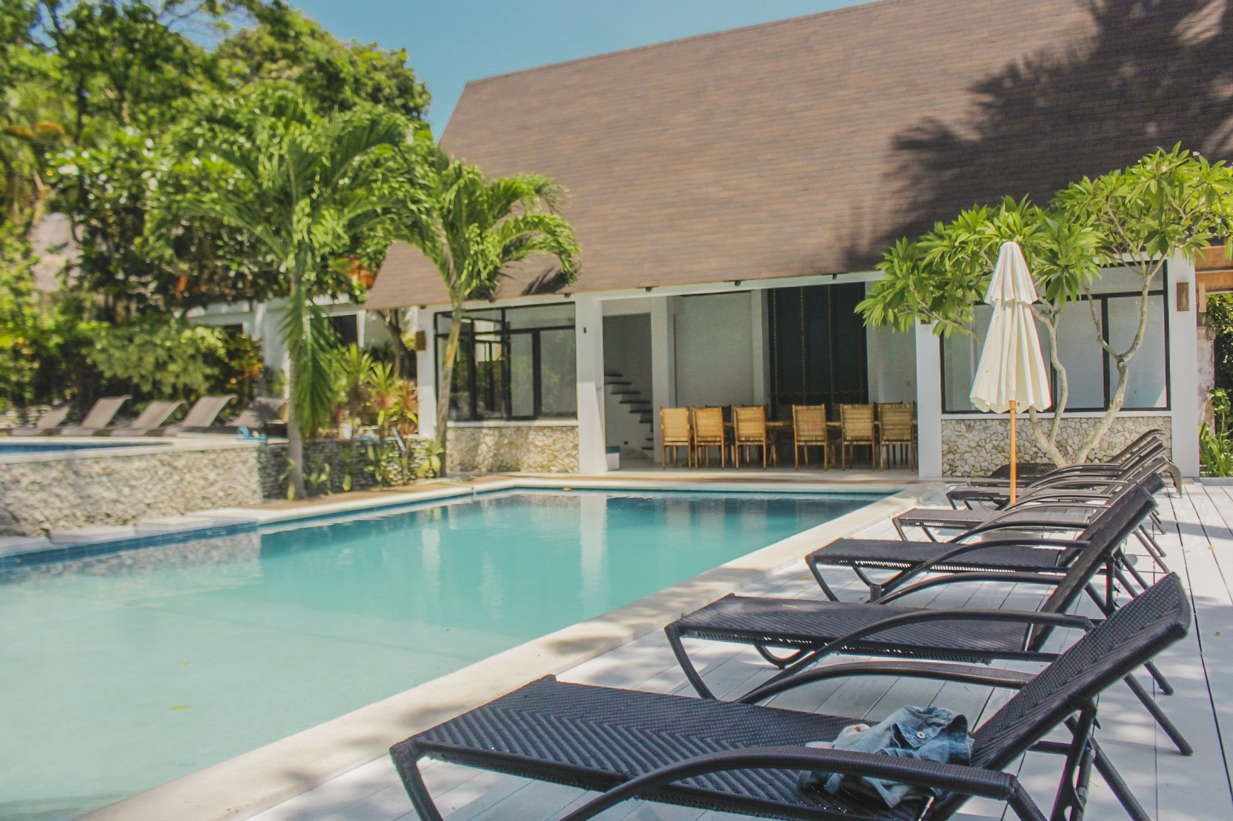 Casalay Boutique Villas and Dive Resort Puerto Galera view of the swimming pool, poolside, and pavilion