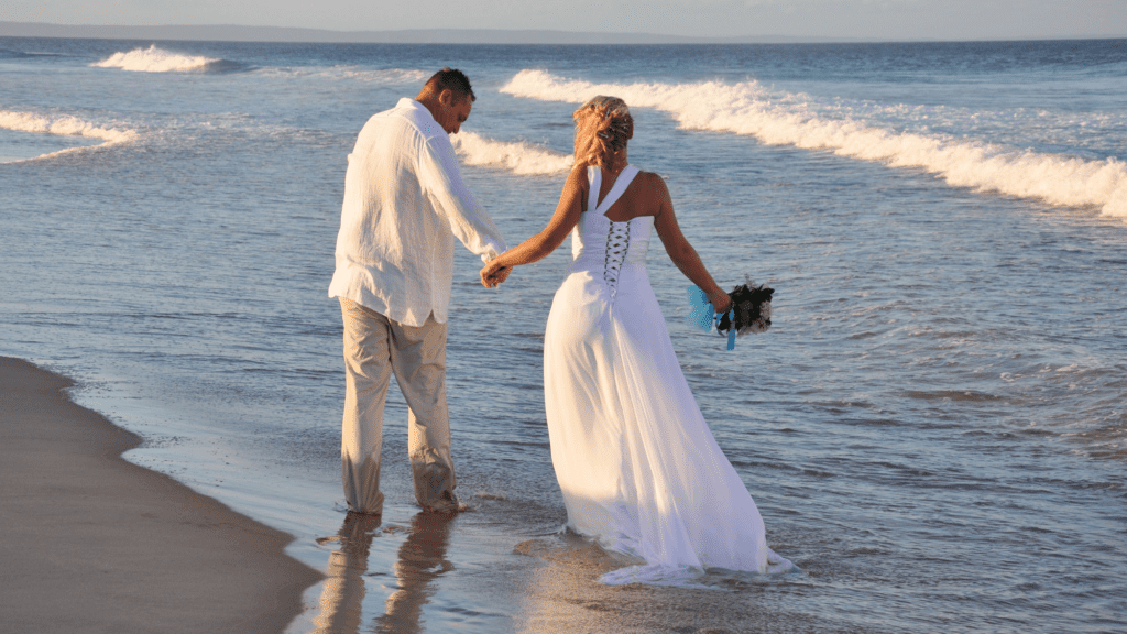 Bride and Groom on a beach after wedding