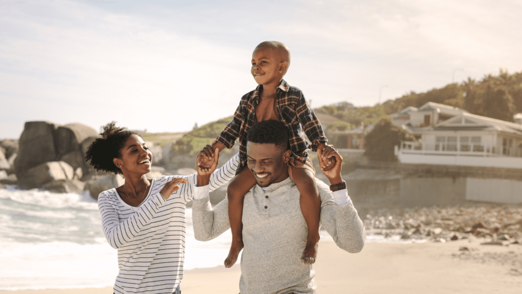 Family enjoying their vacation by the beach